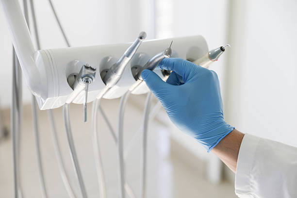 Professional Invisalign Clear Aligners technician working in Malaga, NJ